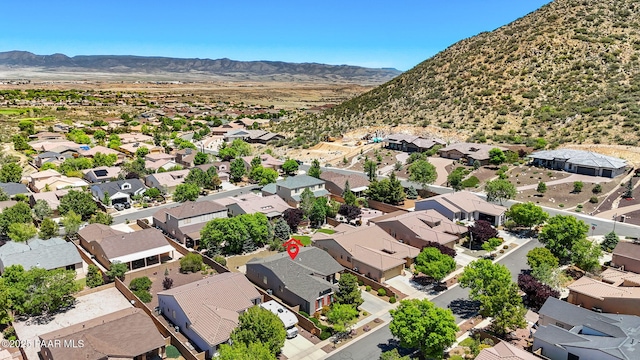 7334 E Goodnight Ln, Prescott Valley, AZ 86314 - aerial perspective of suburban area with a mountain backdrop