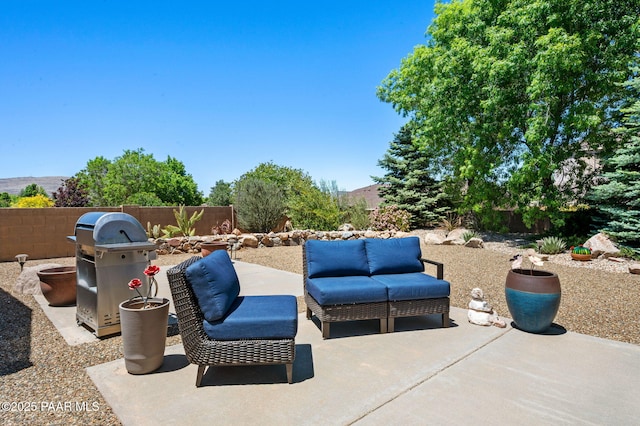 7334 E Goodnight Ln, Prescott Valley, AZ 86314 - view of patio / terrace featuring a grill and an outdoor living space