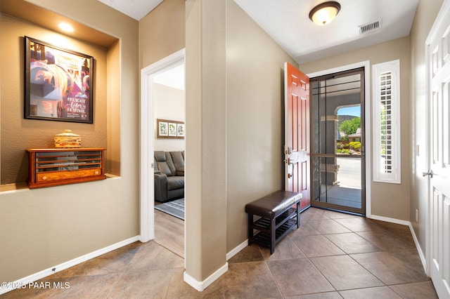 7334 E Goodnight Ln, Prescott Valley, AZ 86314 - tiled foyer entrance featuring healthy amount of natural light and baseboards