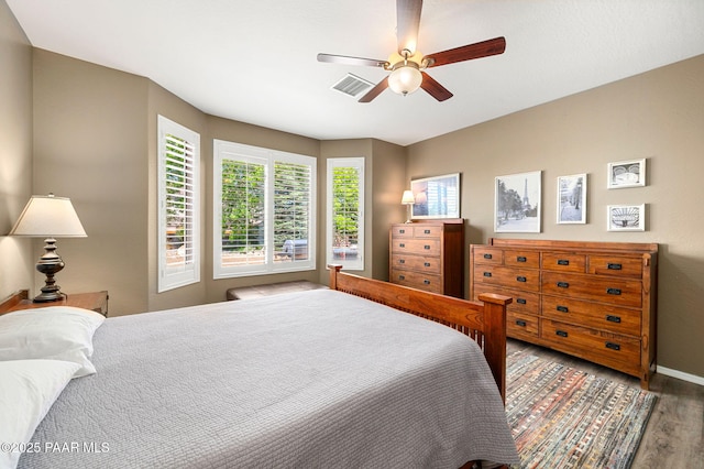 7334 E Goodnight Ln, Prescott Valley, AZ 86314 - bedroom featuring wood finished floors, baseboards, and a ceiling fan