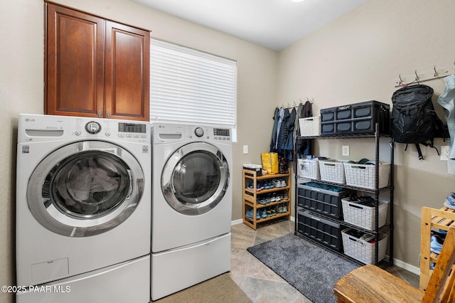 7334 E Goodnight Ln, Prescott Valley, AZ 86314 - washroom with cabinet space, washer and clothes dryer, and baseboards