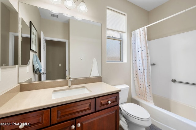 7334 E Goodnight Ln, Prescott Valley, AZ 86314 - bathroom featuring toilet, vanity, and shower / bath combo