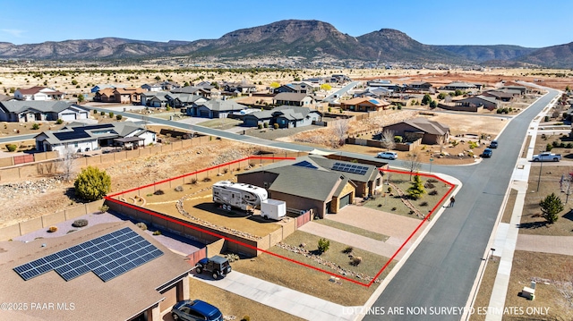 birds eye view of property featuring a residential view and a mountain view