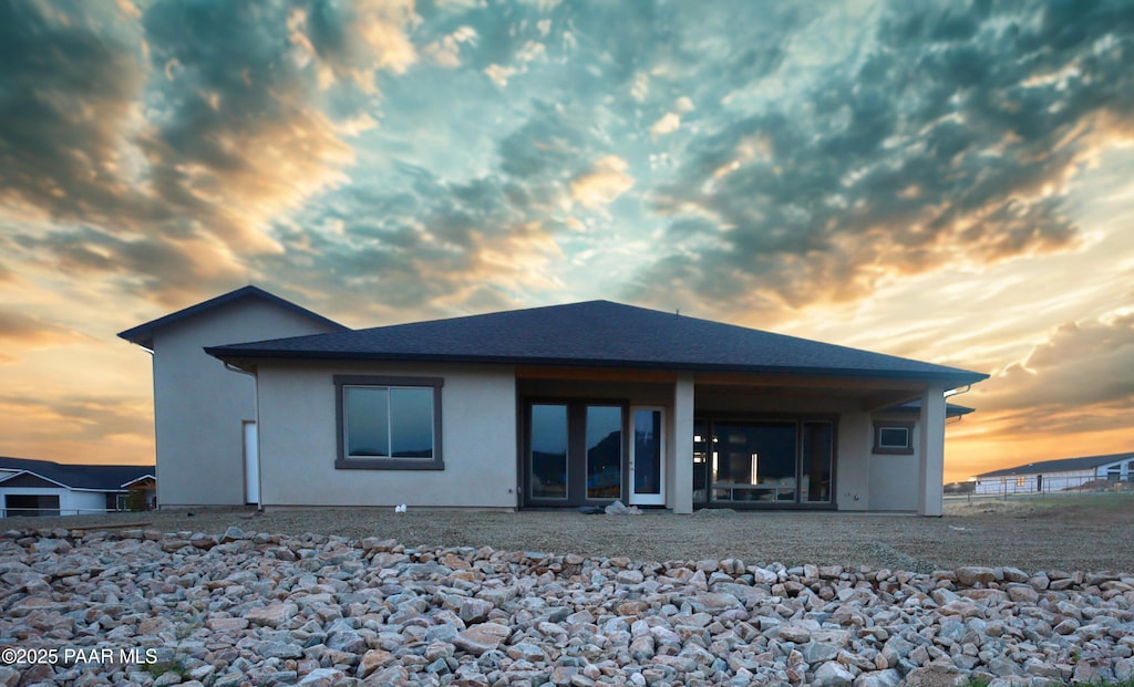 9827 N Constellation Ct, Prescott Valley, AZ 86315 - back of property with stucco siding and french doors