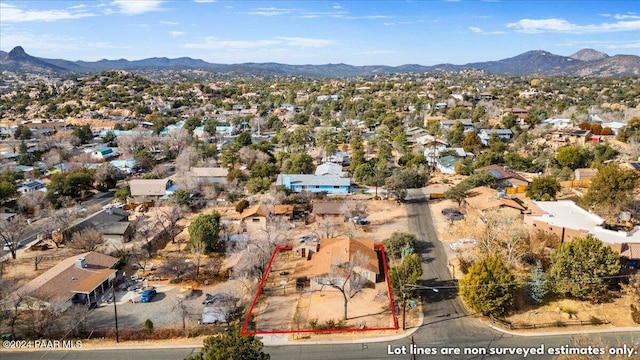 drone / aerial view featuring a mountain view