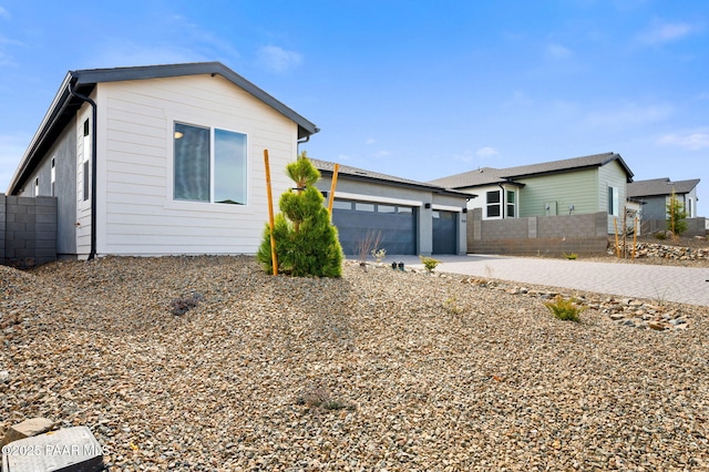 7519 E Louie Ln, Prescott Valley, AZ 86315 - view of front of home featuring an attached garage, fence, and driveway