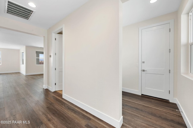 7519 E Louie Ln, Prescott Valley, AZ 86315 - hall featuring dark wood finished floors, baseboards, and visible vents