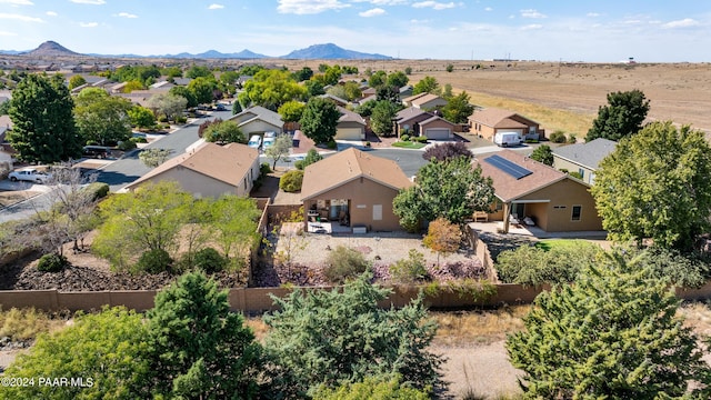 drone / aerial view featuring a mountain view