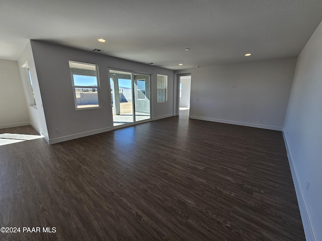 empty room featuring dark hardwood / wood-style floors