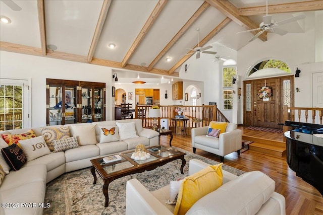 1167 Eagles Nest, Prescott, AZ 86303 - living area with high vaulted ceiling, beam ceiling, ceiling fan, and arched walkways