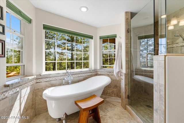 1167 Eagles Nest, Prescott, AZ 86303 - full bath with a stall shower, a freestanding bath, tile walls, and tile patterned floors