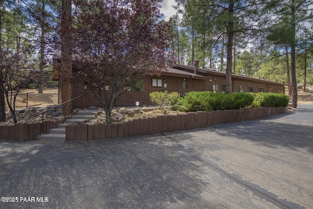 1167 Eagles Nest, Prescott, AZ 86303 - view of front of home featuring a chimney