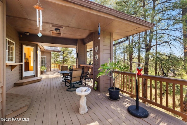 1167 Eagles Nest, Prescott, AZ 86303 - wooden terrace with outdoor dining space