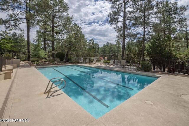 1167 Eagles Nest, Prescott, AZ 86303 - community pool featuring a patio area and view of scattered trees