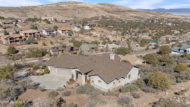 bird's eye view featuring a residential view and a mountain view