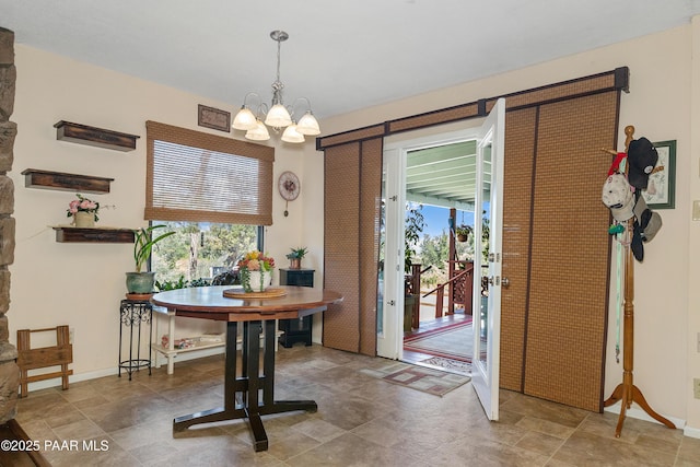 1116 Christie Ln, Prescott, AZ 86305 - dining room with baseboards and an inviting chandelier