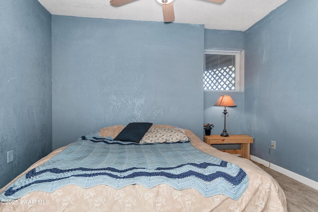 1116 Christie Ln, Prescott, AZ 86305 - bedroom featuring baseboards, a ceiling fan, and wood finished floors