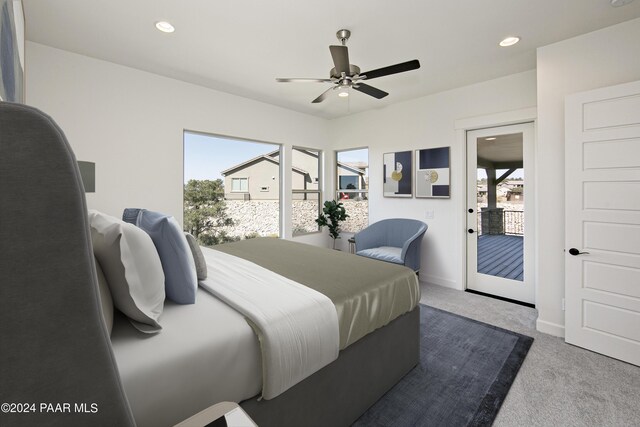 12290 N Thrine Cir, Prescott, AZ 86305 - bedroom featuring multiple windows, recessed lighting, carpet flooring, and access to outside