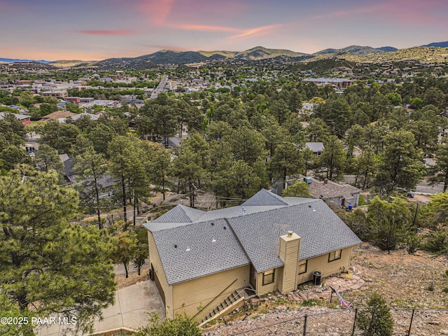 aerial view at dusk with a mountain view