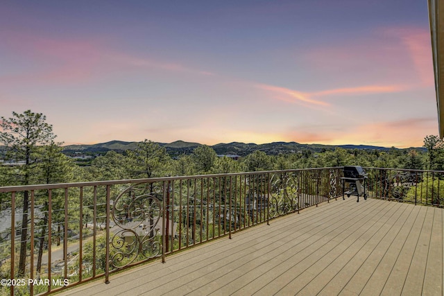 deck featuring area for grilling and a mountain view