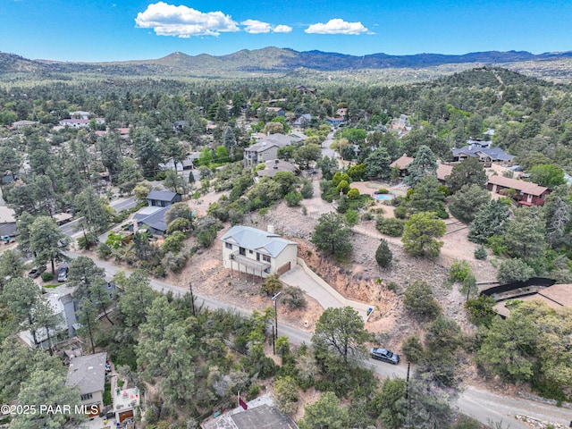 drone / aerial view featuring a mountain view