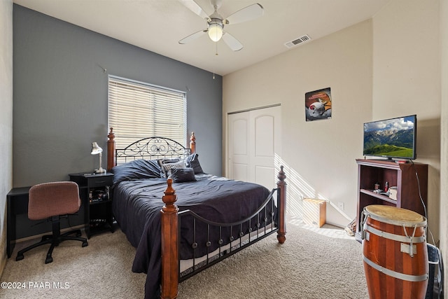 bedroom featuring ceiling fan, carpet floors, and a closet