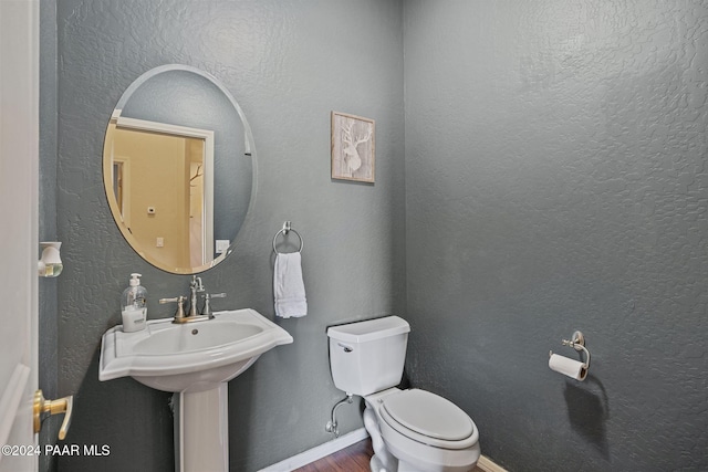 bathroom featuring toilet