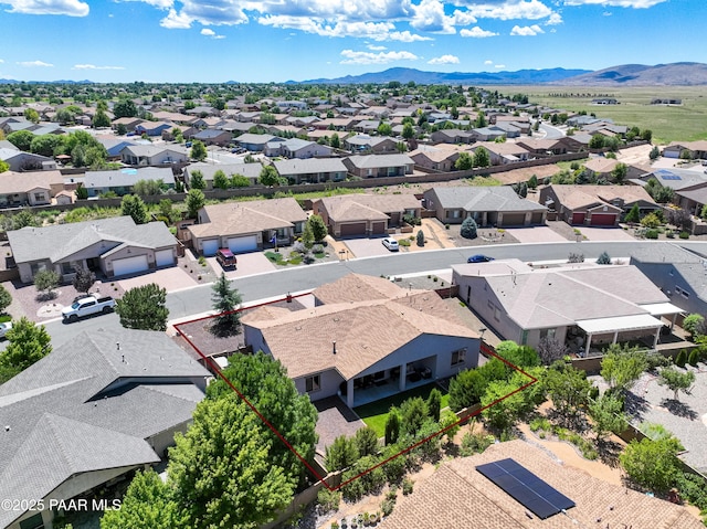 bird's eye view featuring a residential view and a mountain view