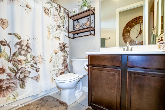 full bathroom featuring toilet, curtained shower, tile patterned flooring, and vanity