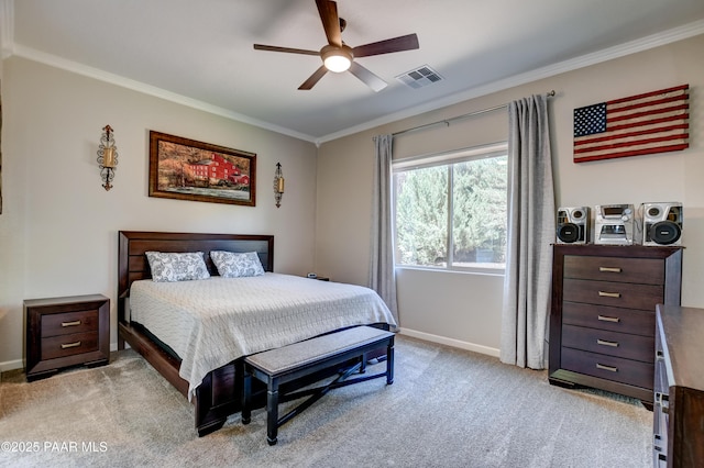 bedroom with ceiling fan, light colored carpet, baseboards, visible vents, and ornamental molding