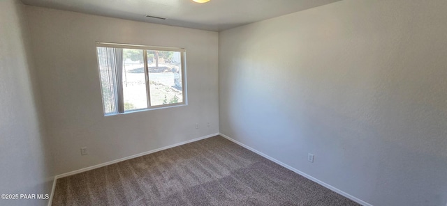 10919 E Roundup Dr, Dewey-Humboldt, AZ 86327 - carpeted spare room featuring baseboards