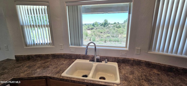 10919 E Roundup Dr, Dewey-Humboldt, AZ 86327 - kitchen view of a sink and dark countertops