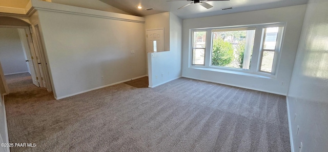 10919 E Roundup Dr, Dewey-Humboldt, AZ 86327 - unfurnished room featuring a ceiling fan, carpet flooring, and lofted ceiling