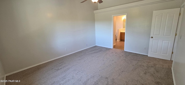 10919 E Roundup Dr, Dewey-Humboldt, AZ 86327 - unfurnished bedroom with carpet floors, ensuite bath, and ceiling fan