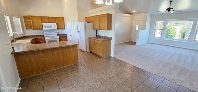 10919 E Roundup Dr, Dewey-Humboldt, AZ 86327 - kitchen featuring white appliances, open shelves, a peninsula, light carpet, and open floor plan