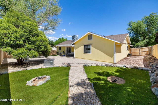 5420 N Mesquite Dr, Prescott Valley, AZ 86314 - back of property with a patio area, roof with shingles, and cooling unit