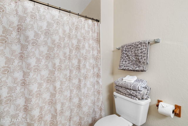 5420 N Mesquite Dr, Prescott Valley, AZ 86314 - bathroom with toilet and a shower with shower curtain