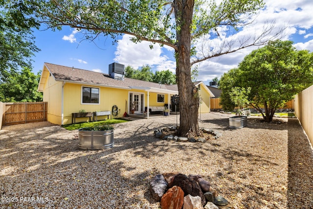 5420 N Mesquite Dr, Prescott Valley, AZ 86314 - rear view of house with a fenced backyard, cooling unit, and a patio area