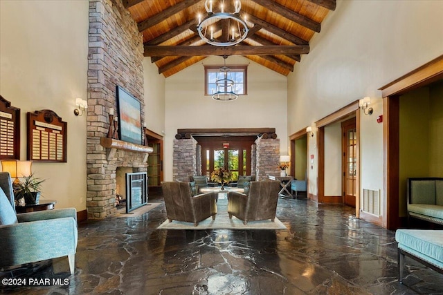 living room with a wealth of natural light, high vaulted ceiling, and wooden ceiling