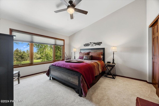 bedroom with carpet, ceiling fan, and lofted ceiling