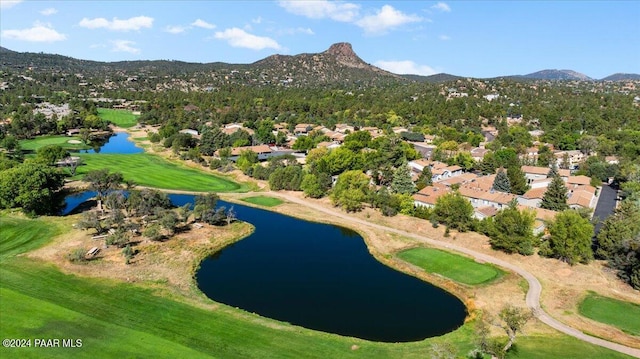 aerial view featuring a water and mountain view