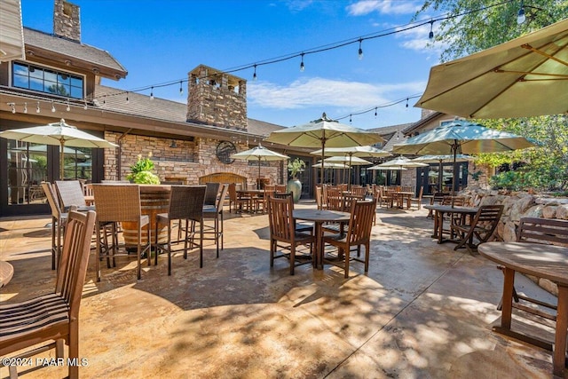 view of patio / terrace featuring exterior bar