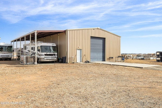 view of outbuilding featuring a garage