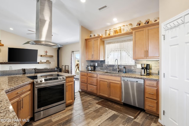 kitchen with sink, light stone counters, appliances with stainless steel finishes, dark hardwood / wood-style flooring, and island exhaust hood