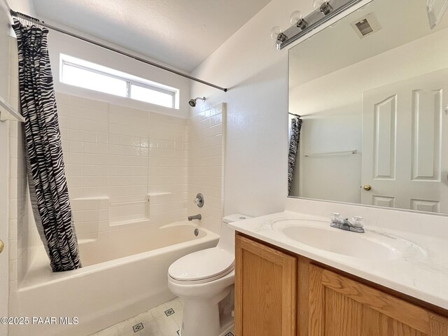 bathroom featuring tile patterned flooring, toilet, visible vents, vanity, and shower / tub combo with curtain