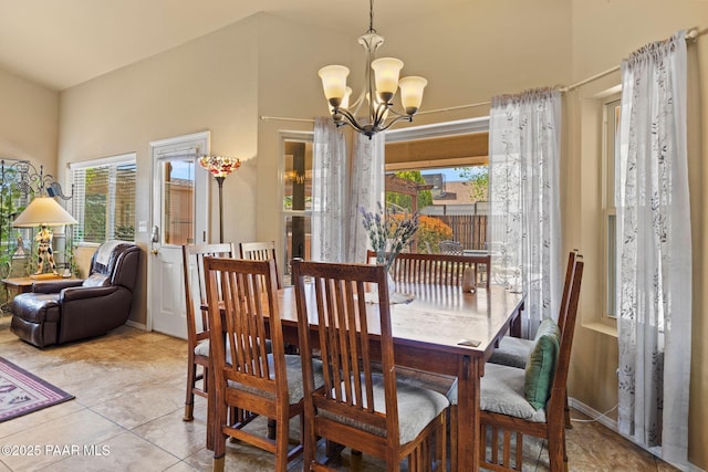 5278 N Saddleback Dr, Prescott Valley, AZ 86314 - tiled dining room featuring baseboards, a chandelier, and a healthy amount of sunlight