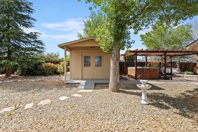5278 N Saddleback Dr, Prescott Valley, AZ 86314 - view of outdoor structure with an outdoor structure, a fenced backyard, and a pergola