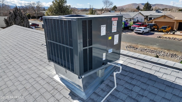 details featuring cooling unit and a mountain view