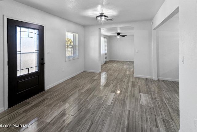 foyer entrance featuring hardwood / wood-style flooring