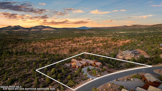 aerial view at dusk with a mountain view